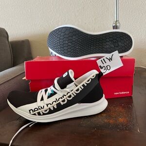 New Balance Black and White Athletic Shoes